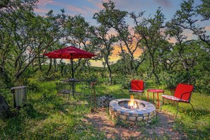 Fire pit in front of cabin