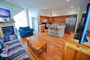 Living room and kitchen open up together.
