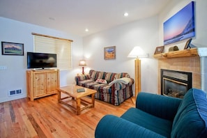 Living area with flat screen TV.