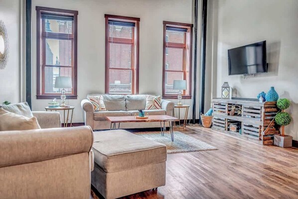Pull out full couch and single. 55" Samsung Smart TV with soundbar and subwoofer. Hulu Live included. 