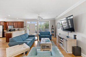 This comfy living room offers space for everyone to gather!