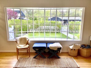 Large windows overlooking private front yard