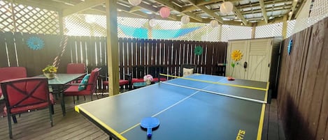 Covered back entertainment big patio with Ping Pong Table & Egg Chair Swings