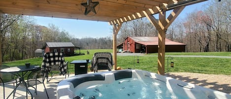 The backyard patio!  Includes Hot Tub for two, a Blackstone Grill and fire pit!