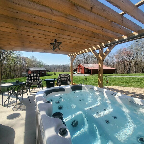 The backyard patio!  Includes Hot Tub for two, a Blackstone Grill and fire pit!