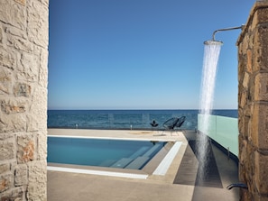 With an infinity pool, embellished with a spa whirlpool & outdoor shower. 