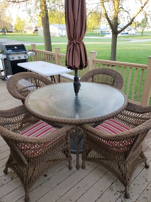 Beautiful wicker patio set located on the deck.