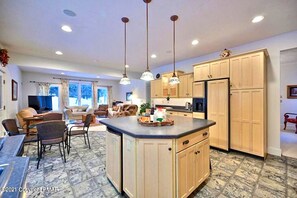 Kitchen island with view of living room 