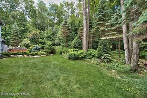 Back yard, hot tub and deck