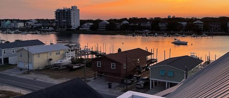 Sunset views over the canal from our 5th floor rooftop deck.