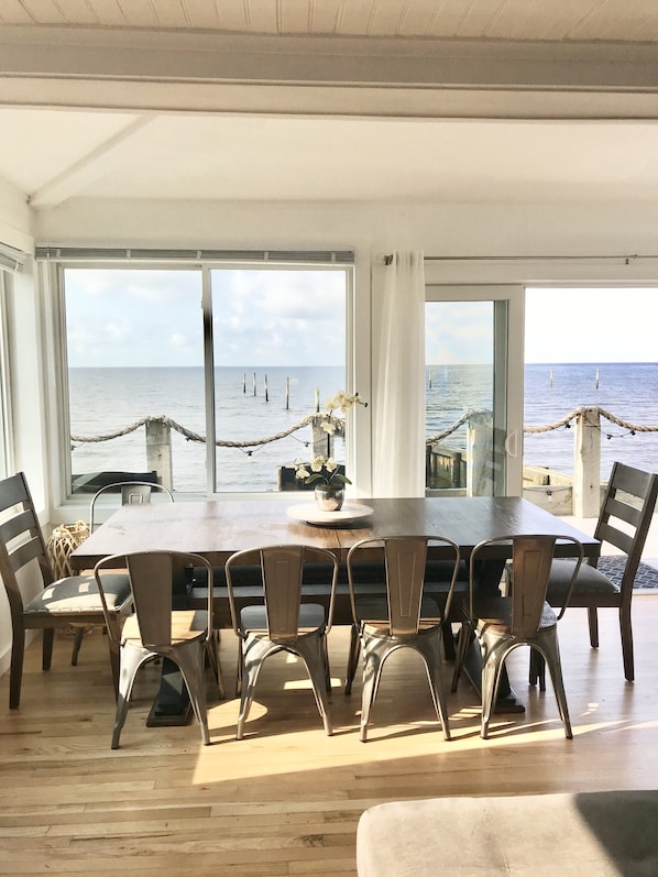 Dining area overlooking private beachfront