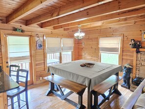 The bench seating can seat up to 12, with 2 extra stools at the kitchen counter.
