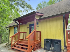 After parking your car, follow the walkway to find our front porch with main door.