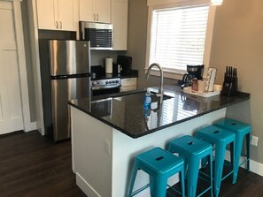 Large island in kitchen with seating for eating