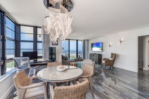 Dining area below the gorgeous chandelier.