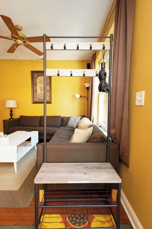 Shoe and coat rack by your entrance through the back door.