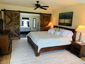 View from the Master bedroom into Bedroom 2 with the barn doors open