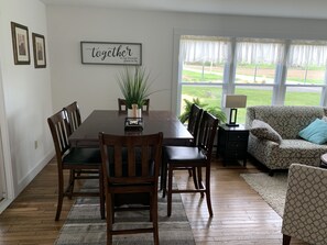 Breakfast nook with expandable high top table. Extra stools available.