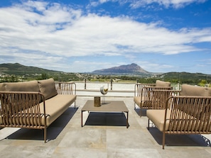 Cloud, Sky, Furniture, Building, Table, Mountain, Wood, Outdoor Furniture, House, Grass