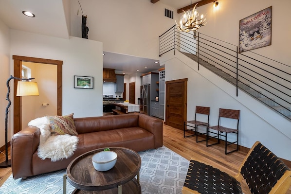 High ceiling creates a bright and warm living space.