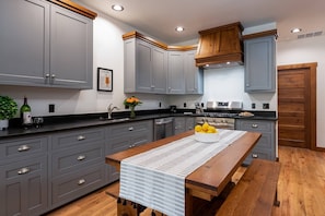 The kitchen has ample counter space for easy meal preparation.