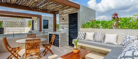 Are you here yet?This incredible private rooftop lounge w/ jungle views!