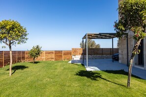 A modern Cretan hideaway complete with beautiful gardens.