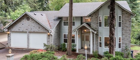 Main house with front entrance and driveway