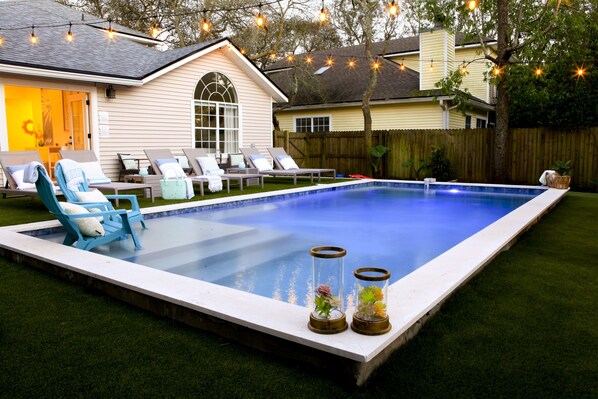 Heated pool with sun shelf