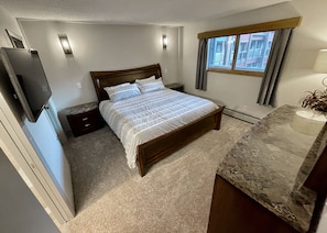 Master bedroom w/ king memory foam bed, walk-in closet, and ensuite bathroom