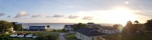 Panoramic view: sunrise over Bogue Sound, from the bedroom deck.