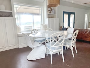 Dining space flows into an open living room