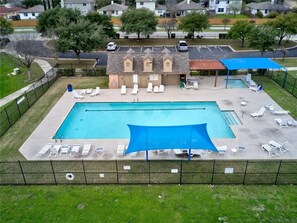 Enjoy the community pool just two blocks down the road