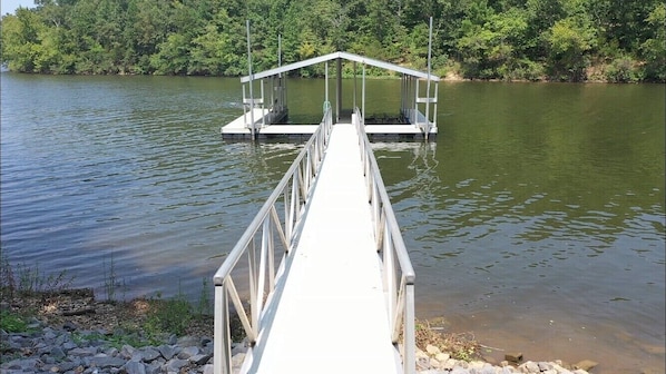 Dock - left slip is available with rental - 12’ wide slip