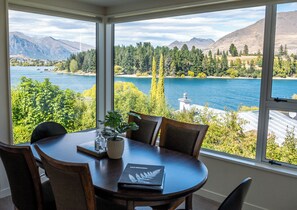Views from the dining table (with new timber flooring and roller blinds)