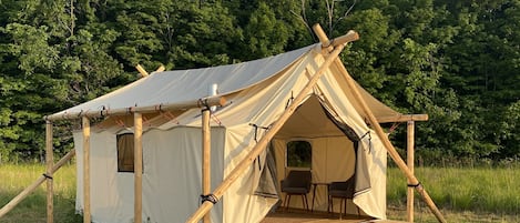 One of our luxury safari tents, tucked against the Michigan woods