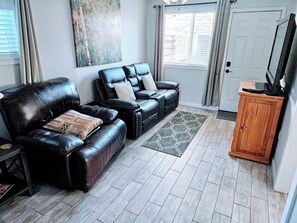 Power reclining loveseat and oversized reclining chair