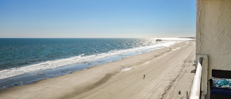 This condo has a balcony overlooking the beach and the Garden City Pier.