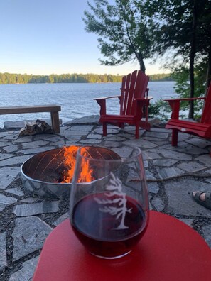 Lakeside Fire Pit with seating. Enjoy the peaceful lake views by a warm fire.
