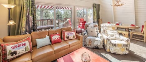 Beary cozy living room with high picture windows