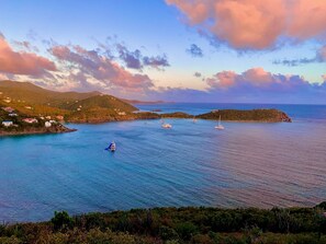 Pink and orange skies above the beautiful Caribbean ocean