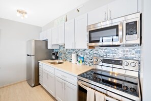 The unit has an updated fully equipped kitchen perfect for your culinary needs!