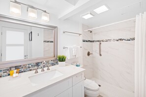 This unit has a full bathroom with a walk-in shower!