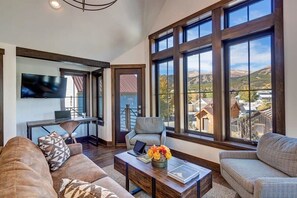 Living room has great views of the ski resort