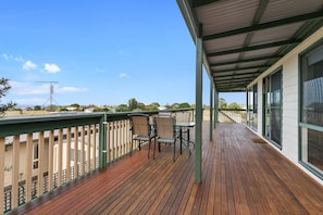 Spacious deck with fantastic views of Cape Patton the harbour and the hills