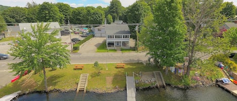 House and waterfront yard with dock