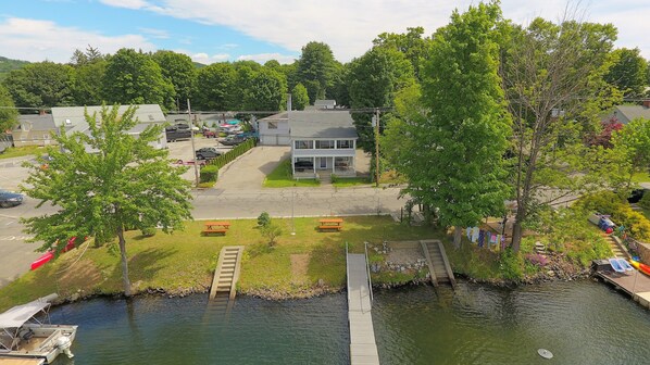 House and waterfront yard with dock