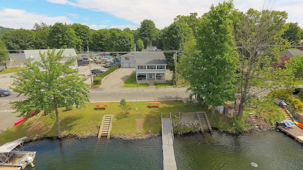 House and waterfront yard with dock