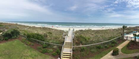 View from end of hallway facing beach. Small crowds are typical for the summer.