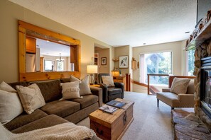 Main Floor - Living Room With Wood Burning Fireplace